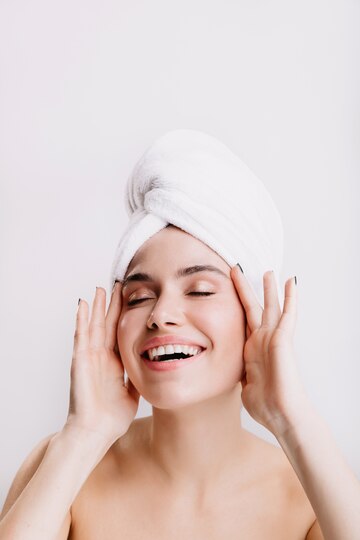 positive-lady-enjoys-morning-spa-treatment-girl-after-shower-posing-isolated-wall_197531-13924.jpg__PID:8f9d324c-1466-4191-9ab3-0ac85669bfdd
